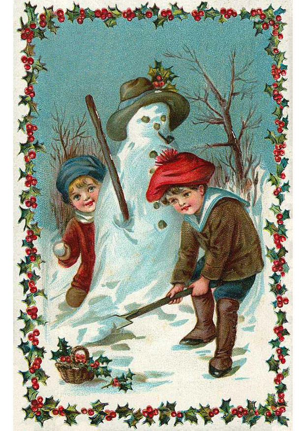 Bild Kinder bauen einen Schneemann