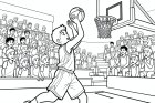 Junge spielt Basketball